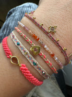 HANDMADE HEART BRACELET IN PINK TONES FEATURING A PINK TOURMALINE STONE