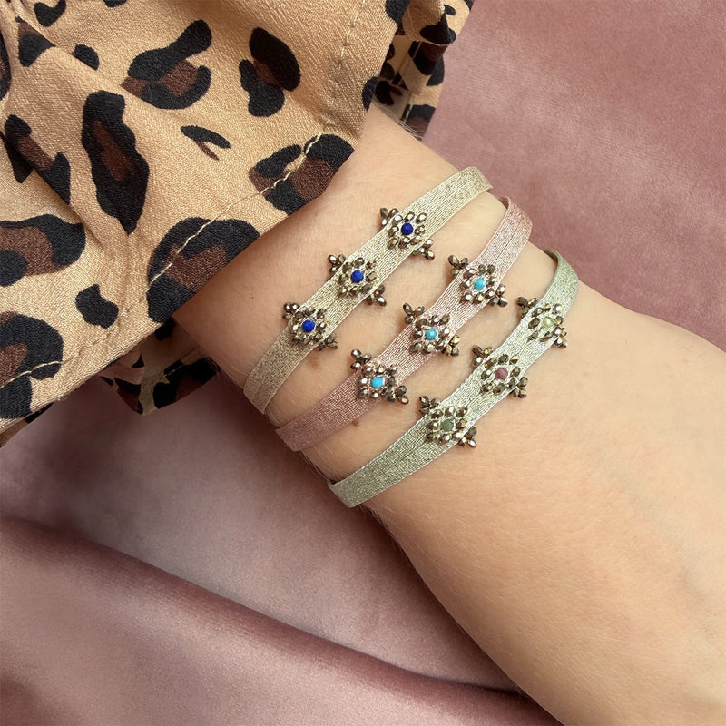 All three Emma bracelets worn together: lapis lazuli, turquoise and watermelon tourmaline