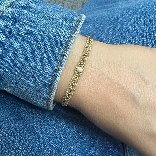 Kiara river stone and 14k gold-filled bracelet worn on the wrist