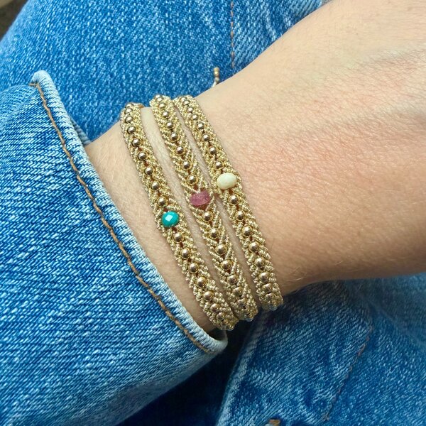 Three Kiara bracelet styles worn together: turquoise, river stone and pink tourmaline. Each sold individually.