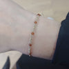 HANDMADE STONE SAND BRACELET FEATURING HESSONITE STONE AND GOLD BEADS DETAILS