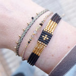 BEADS HANDWOVEN BRACELET WITH GOLD BEADS AND A SPINEL SEMI-PRECIOUS STONE