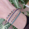 Designed and handwoven to be worn at all times using traditional artisanal handcrafting and techniques that take plenty of time and love.  This bracelet is handmade using polyester threads in sparkling neutral colours.  Details:  - Handwoven using Polyester  -Can be worn in the water  - Stainless steel "LeJu London" logo/tag  - Width 3mm