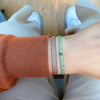 DIAMOND ICE HANDWOVEN BRACELET IN GREEN & SILVER TONES