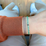 DIAMOND ICE HANDWOVEN BRACELET IN GREEN & SILVER TONES