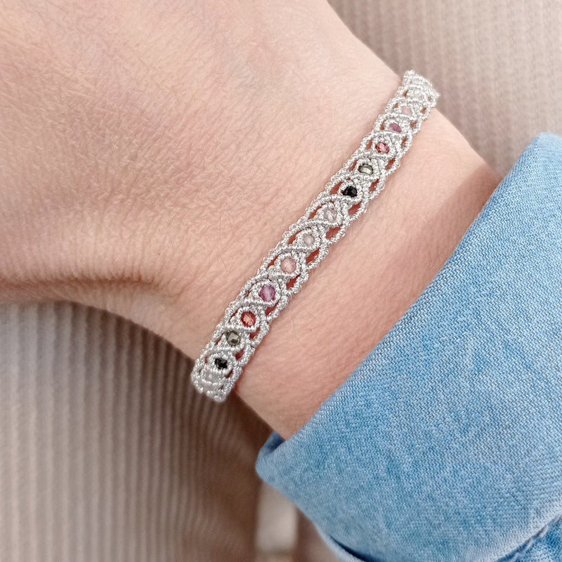 HANDWOVEN ROMA BRACELET IN SILVER TONES FEATURING GEMSTONES DETAIL