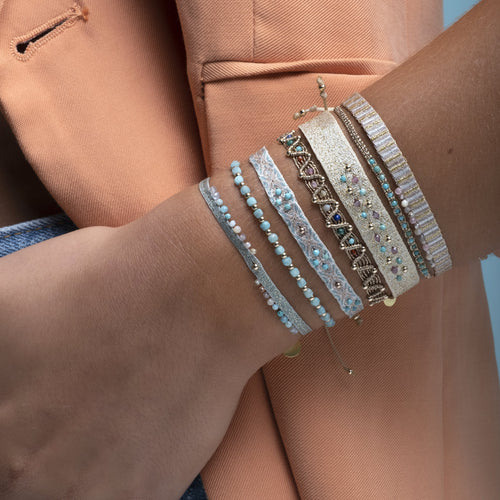   - Handwoven using Polyester  -Semi-precious stones  -14  gold filled beads  - Can be worn in the water - Width 8 mm -Adjustable bracelet -Women bracelet