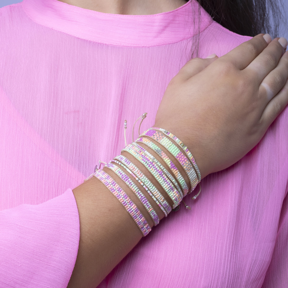 HANDMADE BEADED BRACELET IN NEON ORANGE AND PINK TONES shop.lejudesigns