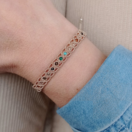 HANDWOVEN ROMA BRACELET IN GOLD TONES FEATURING GEMSTONES DETAIL