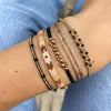 HANDMADE NORA BLACK AND GOLD BRACELET FEATURING SPINEL SEMI-PRECIOUS STONES