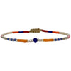   Handwoven in Colombia, this feminine bracelet features a single row of Japanese glass beads in gold and bright tones with a Lapis Lazuli stone of strenght and discipline in the centre.  Wear this stylish bracelet alone or as a part of a bracelet layering combination, with your favourite jeans & t-shirt!  Details:  - Japanese glass beads  - Silver faceted beads  -Lapis lazuli  - Width: 2mm  - Adjustable bracelet 