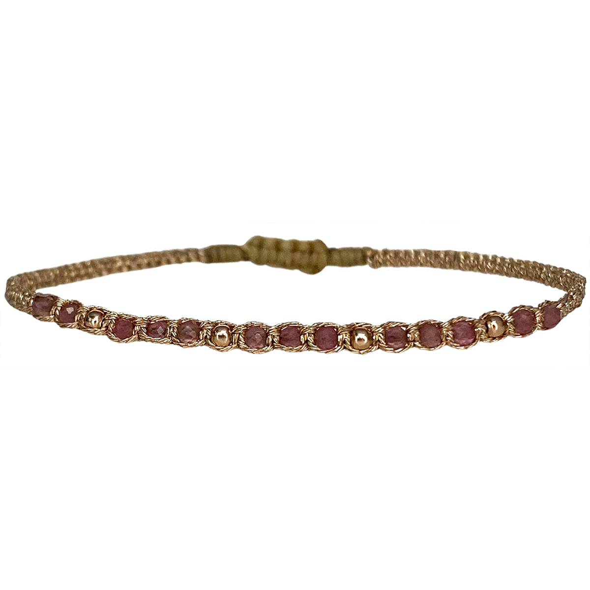ook for the perfect balance of modern and classic with this elegant handmade bracelet.  It is handwoven by our team of artisans using 14k rose gold filled beads, pink tourmaline stones and metallic threads.  Details:  - 14k rose gold filled beads details   -Pink tourmaline stones  - Silver metallic threads  -Adjustable bracelet  -Width: 2mm