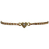 This delicate bracelet is handmade by our team of master artisans using metallic threads and a gold heart charm encrusted with a sparkling quartz stone. It's the perfect accessory to add a little sparkle in your life.  Details:      Quartz semi-precious stone     Gold Vermeil setting     Macramé weaving technique     Adjustable handwoven bracelet     Width 4mm