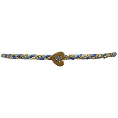 This delicate bracelet is handmade by our team of master artisans using metallic threads and a gold heart charm encrusted with a sparkling quartz stone. It's the perfect accessory to add a little sparkle in your life.  Details:      Quartz semi-precious stone     Gold Vermeil setting     Women bracelet     Adjustable handwoven bracelet     Width 5mm