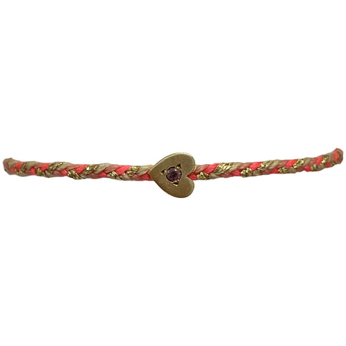 This delicate bracelet is handmade by our team of master artisans using metallic threads and a gold heart charm encrusted with a beautiful pink tourmaline stone. It's the perfect accessory to add a little sparkle in your life.  Details:      Pink tourmaline semi-precious stone     Gold Vermeil setting     Women bracelet     Adjustable handwoven bracelet     Width 5mm