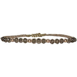 If you wish for sophistication and originality this bracelet is just for you. It is handwoven by our team of artisans using smokey quartz semi-precious stones, 14 k rose gold filled beads and metallic threads.  The smokey quartz provides calmness, balance and positive energy  Details:  - Smokey Quartz semi-precious stones  - 14k rose gold filled beads  - Metallic threads  -Adjustable bracelet  -Width: 4mm