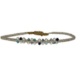  it will illuminate any look. It has been handwoven in Colombia by our team of artisans and features an adjustable pull cord to ensure the perfect fit for all wrists.      Intermixed semi-precious stones     925 sterling silver beads     Handwoven metallic threads     Adjustable pull cord     Width 4mm