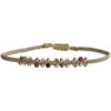 This stunning Nora bracelet will look great on everyone. It can be worn from day to night and with the dramatic centre of Intermixed semi-precious stones & 14K gold, it will illuminate any look. It has been handwoven in Colombia by our team of artisans and features an adjustable pull cord to ensure the perfect fit for all wrists.      Turquoise semi-precious stones     Handwoven metallic threads     Adjustable pull cord     Width 4mm     Can be worn in the  water