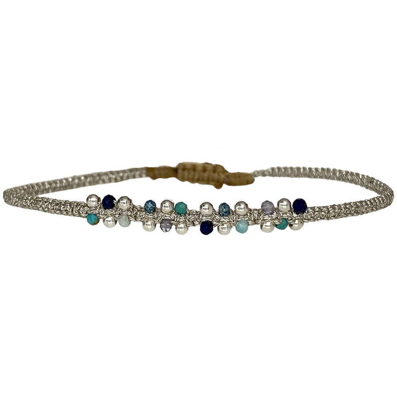  it will illuminate any look. It has been handwoven in Colombia by our team of artisans and features an adjustable pull cord to ensure the perfect fit for all wrists.      Intermixed semi-precious stones     925 sterling silver beads     Handwoven metallic threads     Adjustable pull cord     Width 4mm