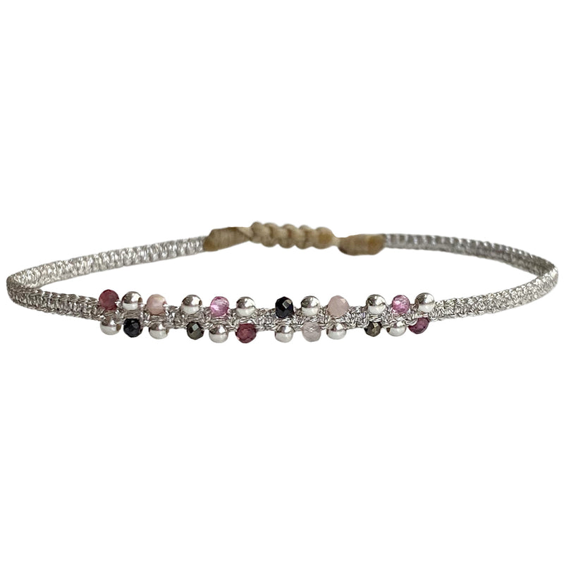      Pink Tourmaline semi-precious stones     925 sterling silver beads     Handwoven metallic threads     Adjustable pull cord     Width 4mm     Can be worn in the  water