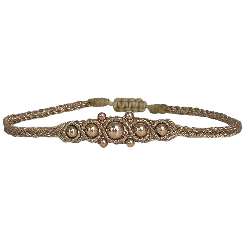 HANDWOVEN ORION BRACELET WITH ROSE GOLD DETAILS