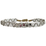 Cool, unique and feminine, this handmade bracelet design is handwoven using a macrame technique, silver beads and intermixed semi precious stones.  Perfect for your summer holidays or to wear  with your favourite jeans   Details:  - Handwoven using metallic threads  - Intermixed semi-precious stones.  - 925 silver beads    - Adjustable Bracelet  - Width: 6mm  -Can be worn in the water