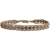 If you wish for simple elegance and versatility this handmade bracelet is just for you. It is handwoven by our team of artisans using intermixed semi-precious stones and metallic threads.  Details:  - Women bracelet  - Semi precious stones  -Adjustable bracelet  -Width: 5mm  -Can be worn in the water