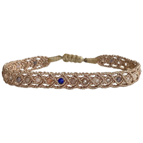 If you wish for simple elegance and versatility this handmade bracelet is just for you. It is handwoven by our team of artisans using intermixed semi-precious stones and metallic threads.  Details:  - Women bracelet  - Semi precious stones  -Adjustable bracelet  -Width: 5mm  -Can be worn in the water