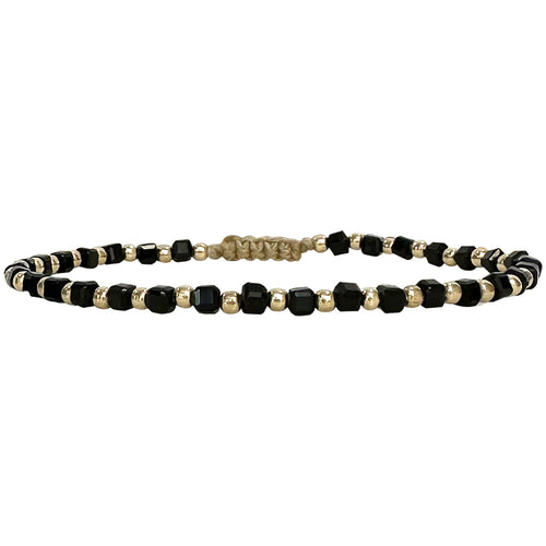 This delicate jewel is handmade using 14kt gold filled beads and spinel semi-precious stones. This beauty will be one of your favorite bracelets as you can wear it with any accessories or outfits. Give to your looks a touch of elegance and sparkle !  Details:  - Spinel semi-precious stones   - 14kt gold filled beads  -Adjustable bracelet  -Width: 2mm  -Can be worn in the water
