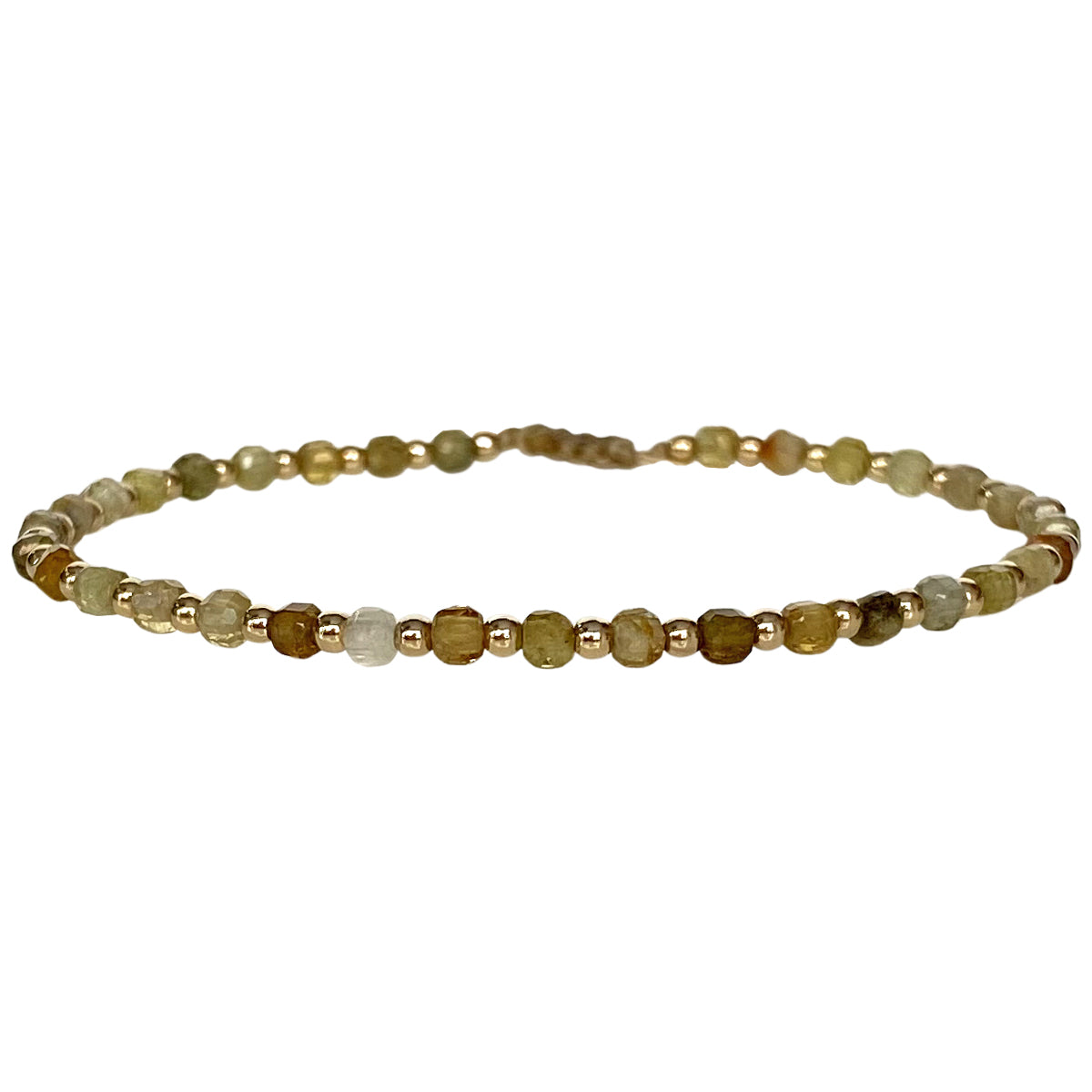 This delicate jewel is handmade using gold filled beads and Tsavorite semi-precious stones. This beauty will be one of your favorite bracelets as you can wear it with any accessories or outfits. Give to your looks a touch of elegance and sparkle !  Details:  - Tsavorite semi-precious stones   - 14 K gold filled beads  -Adjustable bracelet  -width: 2m  -Can be worn in the water