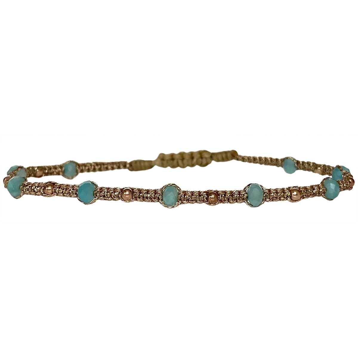 This delicate design is handwoven by our team of artisans in Colombia using metallic threads, amazonite semi-precious stones and 14k rose gold filled beads.  Wear it solo or with your favourite accessories!  Details:  -Handmade bracelet  -Women bracelet  -Metallic threads   -Amazonite semi-precious stones  -14k rose gold filled beads  -Adjustable bracelet   -Width: 3mm  -Can be worn in the water