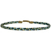 This bracelet is handwoven by our team of master artisans using polyester threads featuring a trenza design in aqua tones. This men's bracelet is cool and elegant perfect to wear everyday.  This bracelet looks great worn solo or layered with other pieces.  Details:      Polyester threads     Men's bracelet     Adjustable bracelet     Width 4mm     Can be worn in the water