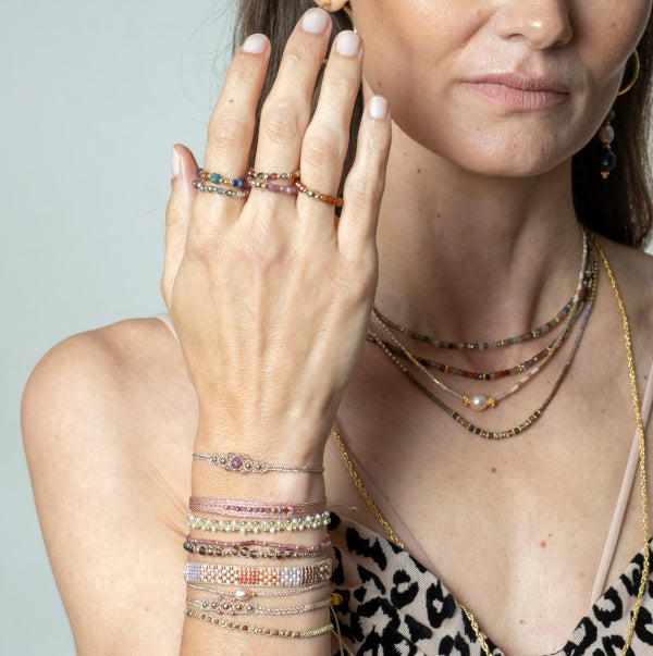 HANDWOVEN ORION BRACELET WITH ROSE GOLD DETAILS