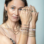 If you wish for sophistication and originality this bracelet is just for you. It is handwoven by our team of artisans using tundra sapphire semi-precious stones, 14 k gold filled beads and metallic threads.  The tundra sapphire stone will bring you balance within the body, lightness and joy.  Details:  - Tundra sapphire semi-precious stones  - 14k gold filled beads  - Metallic threads  -Adjustable bracelet  -Width: 4mm