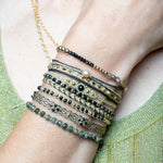 If you wish for sophistication and originality this bracelet is just for you. It is handwoven by our team of artisans using spinel semi-precious stones, 14 k gold filled beads and metallic threads.  The spinel stone will bring you inspiration.  Details:  - Spinel semi-precious stones  - 14k gold filled beads  - Metallic threads  -Adjustable bracelet  -Width: 4mm
