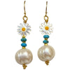 This delicate earrings are handmade by our team of master artisans and decorated with vermeil beads, turquoiose semi-precious stones, mother of pearl flowers and freshwater pearls. Pull your hair back to allow them to really shine.     Details:  - Handmade earrings  - 14K gold filled hooks  -Lenght: 40 mm  -Turquoise, mother of pearl and freshwater pearls  -Vermeil Beads