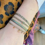 GREEN KYANITE HANDMADE STONE BRACELET ON MODEL
