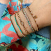 HANDMADE SUN DIAMOND CHARM BRACELET IN GOLD WITH SEMI PRECIOUS STONES