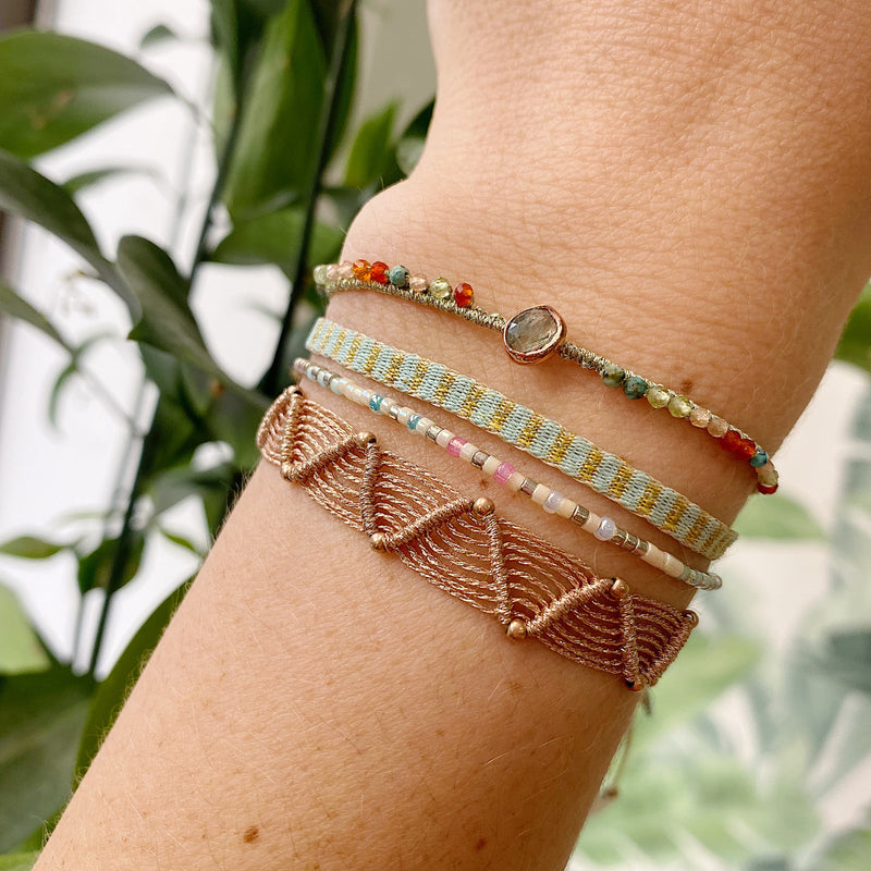 HANDMADE PEACOCK GREEN KYANTINE STONE BRACELET ON MODEL
