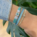 HANDWOVEN HEART BRACELET IN BLUE & SILVER TONES
