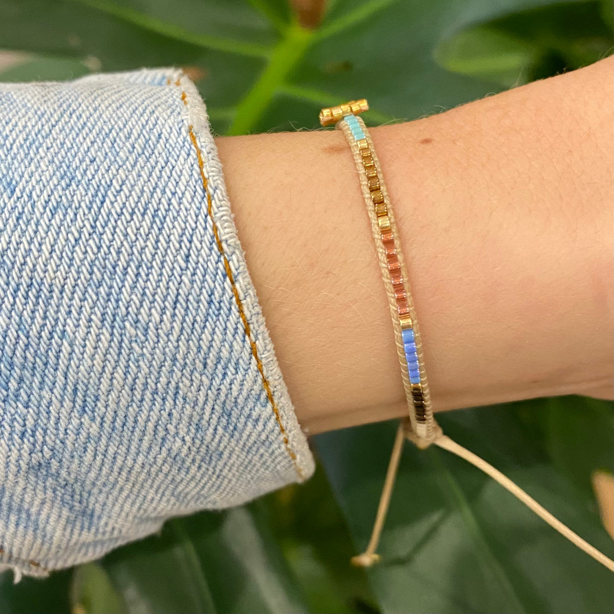 HANDWOVEN HEART BRACELET IN BRIGHT TONES AND GOLD