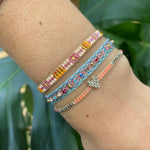 HANDWOVEN HEART BRACELET IN BRIGHT TONES AND SILVER