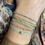 '- Tanzanite Stones  - Vermeil faceted beads  - Width 2mm  -Women bracelet  - Adjustable bracelet  -Can be worn in the  water