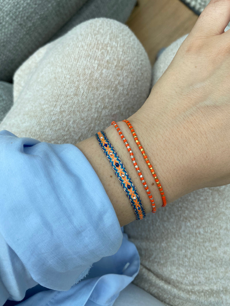 SINGLE HANDWOVEN BRACELET IN ORANGE & SILVER