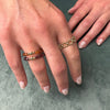 RHODOLITE RING WITH GOLD DETAILS