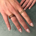 RHODOLITE RING WITH GOLD DETAILS