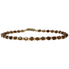 This delicate jewel is handmade using 14kt gold filled beads and hessonite semi-precious stones. This beauty will be one of your favorite bracelets as you can wear it with any accessories or outfits. Give to your looks a touch of elegance and sparkle !  Details:  - Hessonite semi-precious stones   - 14kt gold filled beads  -Adjustable bracelet  -width: 2mm