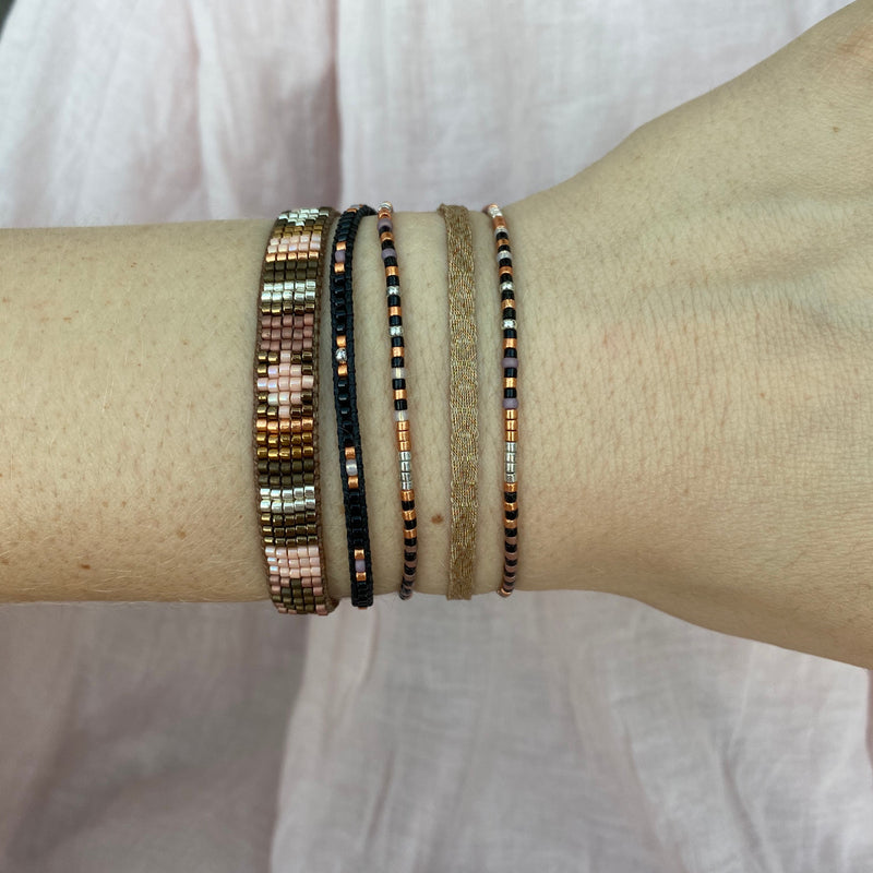 SET OF THREE BRACELETS IN BLACK AND NUDE TONES