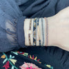 TRENZA HANDWOVEN BRACELET IN GREY & ROSE GOLD