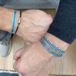 HANDWOVEN BRACELET IN AQUA TONES AND GOLD DETAILS FOR HIM